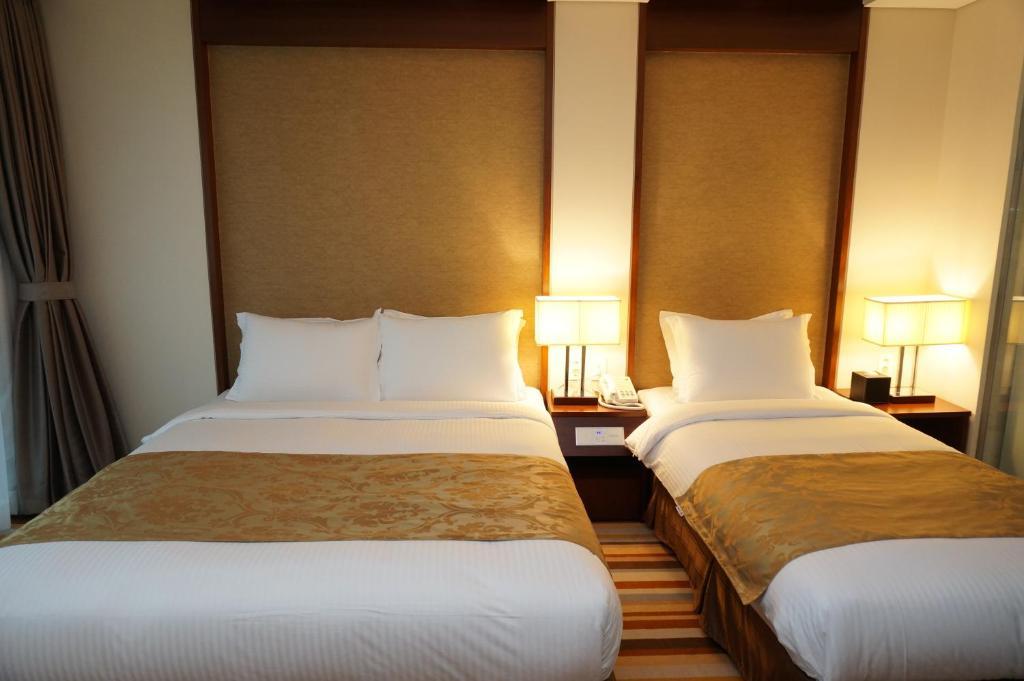เจจูรอนโฮเต็ล Hotel เมืองเชจู ห้อง รูปภาพ